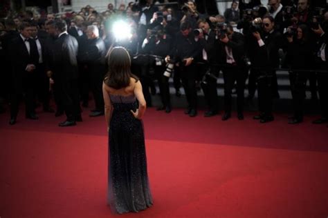 CANNES PHOTOS: In the festival’s blur, someone’s always watching